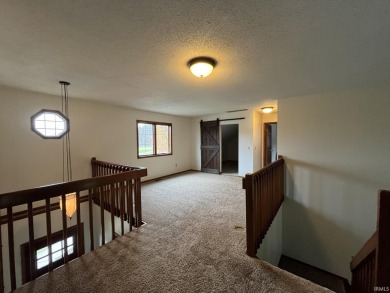 You could make this contemporary four bedroom home yours for the on Cobblestone Golf Course in Indiana - for sale on GolfHomes.com, golf home, golf lot