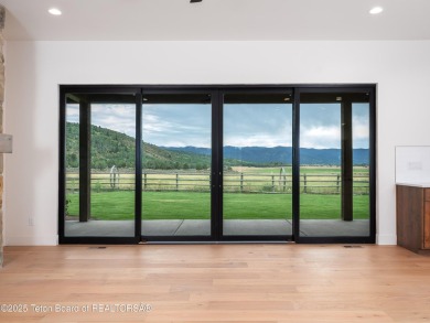 This brand-new custom home in Teton Reserve sits on one of the on Teton Reserve in Idaho - for sale on GolfHomes.com, golf home, golf lot