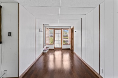Discover this beautifully updated 1,400 sqft ranch, perfect for on Flushing Valley Golf and Country Club in Michigan - for sale on GolfHomes.com, golf home, golf lot