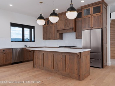 This brand-new custom home in Teton Reserve sits on one of the on Teton Reserve in Idaho - for sale on GolfHomes.com, golf home, golf lot