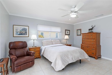 Experience quintessential Florida living in this spacious on Village Green Golf Club of Sarasota in Florida - for sale on GolfHomes.com, golf home, golf lot