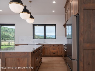 This brand-new custom home in Teton Reserve sits on one of the on Teton Reserve in Idaho - for sale on GolfHomes.com, golf home, golf lot
