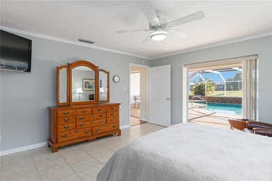 Experience quintessential Florida living in this spacious on Village Green Golf Club of Sarasota in Florida - for sale on GolfHomes.com, golf home, golf lot