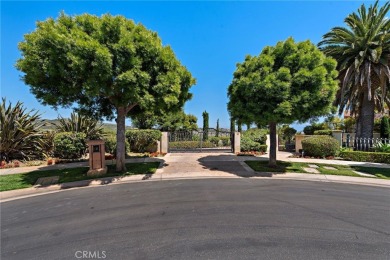 Indulge in elegant coastal living at this opulent ocean-view on Pelican Hill Golf Club in California - for sale on GolfHomes.com, golf home, golf lot