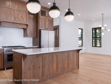 This brand-new custom home in Teton Reserve sits on one of the on Teton Reserve in Idaho - for sale on GolfHomes.com, golf home, golf lot