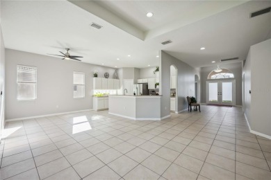 This beautiful single-level home features three bedrooms plus a on Stoneybrook Golf Club At Heritage Harbour in Florida - for sale on GolfHomes.com, golf home, golf lot