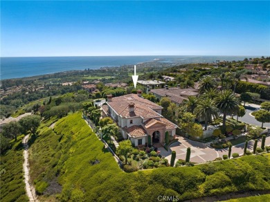 Indulge in elegant coastal living at this opulent ocean-view on Pelican Hill Golf Club in California - for sale on GolfHomes.com, golf home, golf lot