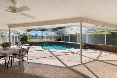 Experience quintessential Florida living in this spacious on Village Green Golf Club of Sarasota in Florida - for sale on GolfHomes.com, golf home, golf lot