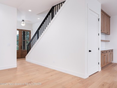This brand-new custom home in Teton Reserve sits on one of the on Teton Reserve in Idaho - for sale on GolfHomes.com, golf home, golf lot