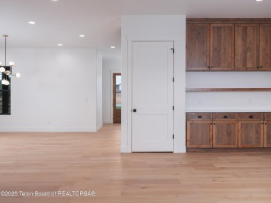 This brand-new custom home in Teton Reserve sits on one of the on Teton Reserve in Idaho - for sale on GolfHomes.com, golf home, golf lot