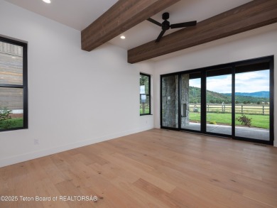 This brand-new custom home in Teton Reserve sits on one of the on Teton Reserve in Idaho - for sale on GolfHomes.com, golf home, golf lot