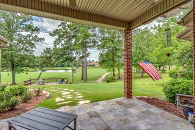 What a fabulous custom home overlooking 2 ponds on the 13th on Castlewoods Golf Club in Mississippi - for sale on GolfHomes.com, golf home, golf lot