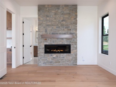 This brand-new custom home in Teton Reserve sits on one of the on Teton Reserve in Idaho - for sale on GolfHomes.com, golf home, golf lot