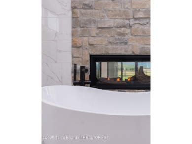 This brand-new custom home in Teton Reserve sits on one of the on Teton Reserve in Idaho - for sale on GolfHomes.com, golf home, golf lot
