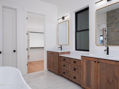 This brand-new custom home in Teton Reserve sits on one of the on Teton Reserve in Idaho - for sale on GolfHomes.com, golf home, golf lot