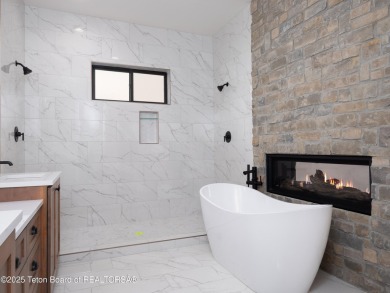 This brand-new custom home in Teton Reserve sits on one of the on Teton Reserve in Idaho - for sale on GolfHomes.com, golf home, golf lot