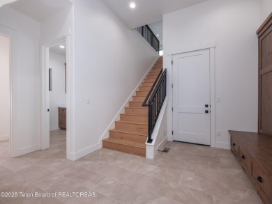 This brand-new custom home in Teton Reserve sits on one of the on Teton Reserve in Idaho - for sale on GolfHomes.com, golf home, golf lot
