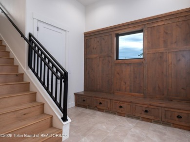 This brand-new custom home in Teton Reserve sits on one of the on Teton Reserve in Idaho - for sale on GolfHomes.com, golf home, golf lot