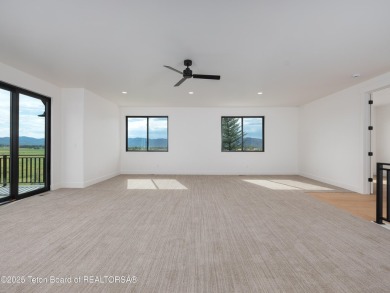 This brand-new custom home in Teton Reserve sits on one of the on Teton Reserve in Idaho - for sale on GolfHomes.com, golf home, golf lot