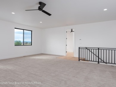 This brand-new custom home in Teton Reserve sits on one of the on Teton Reserve in Idaho - for sale on GolfHomes.com, golf home, golf lot