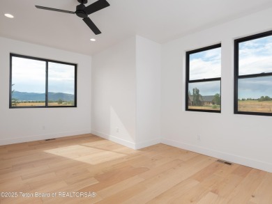 This brand-new custom home in Teton Reserve sits on one of the on Teton Reserve in Idaho - for sale on GolfHomes.com, golf home, golf lot