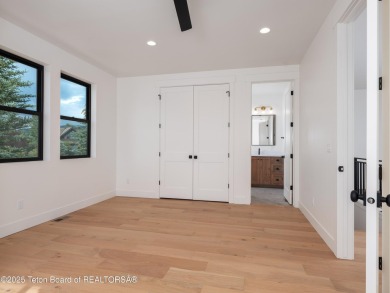 This brand-new custom home in Teton Reserve sits on one of the on Teton Reserve in Idaho - for sale on GolfHomes.com, golf home, golf lot