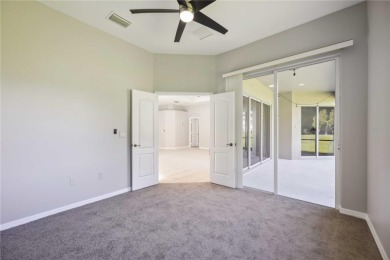 This beautiful single-level home features three bedrooms plus a on Stoneybrook Golf Club At Heritage Harbour in Florida - for sale on GolfHomes.com, golf home, golf lot