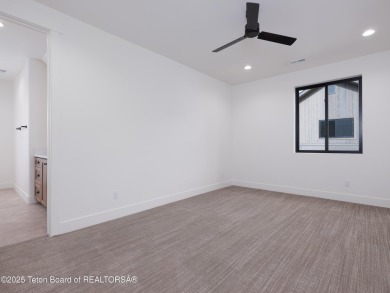 This brand-new custom home in Teton Reserve sits on one of the on Teton Reserve in Idaho - for sale on GolfHomes.com, golf home, golf lot