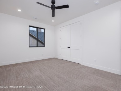 This brand-new custom home in Teton Reserve sits on one of the on Teton Reserve in Idaho - for sale on GolfHomes.com, golf home, golf lot