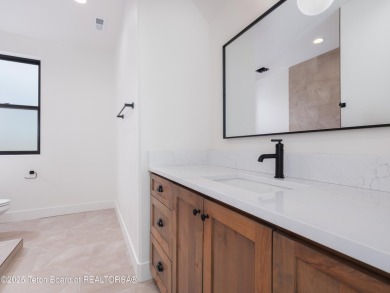 This brand-new custom home in Teton Reserve sits on one of the on Teton Reserve in Idaho - for sale on GolfHomes.com, golf home, golf lot