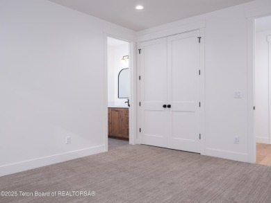 This brand-new custom home in Teton Reserve sits on one of the on Teton Reserve in Idaho - for sale on GolfHomes.com, golf home, golf lot