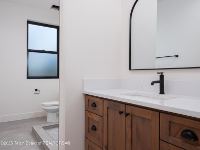This brand-new custom home in Teton Reserve sits on one of the on Teton Reserve in Idaho - for sale on GolfHomes.com, golf home, golf lot