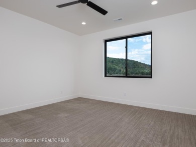 This brand-new custom home in Teton Reserve sits on one of the on Teton Reserve in Idaho - for sale on GolfHomes.com, golf home, golf lot