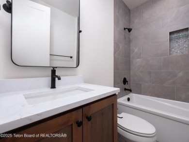 This brand-new custom home in Teton Reserve sits on one of the on Teton Reserve in Idaho - for sale on GolfHomes.com, golf home, golf lot