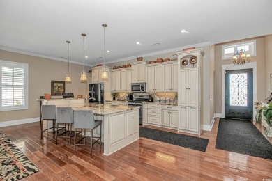 Looking for a SHOWSTOPPER? This pristine, custom built on Barefoot Resort and Golf Club  in South Carolina - for sale on GolfHomes.com, golf home, golf lot