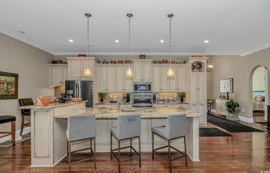 Looking for a SHOWSTOPPER? This pristine, custom built on Barefoot Resort and Golf Club  in South Carolina - for sale on GolfHomes.com, golf home, golf lot
