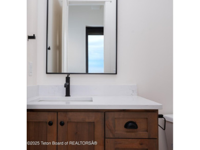This brand-new custom home in Teton Reserve sits on one of the on Teton Reserve in Idaho - for sale on GolfHomes.com, golf home, golf lot
