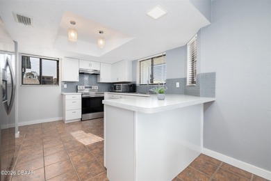 Fully Furnished Lakefront Condo in Guard-Gated Pelican Bay on The Club At Pelican Bay - North Course in Florida - for sale on GolfHomes.com, golf home, golf lot