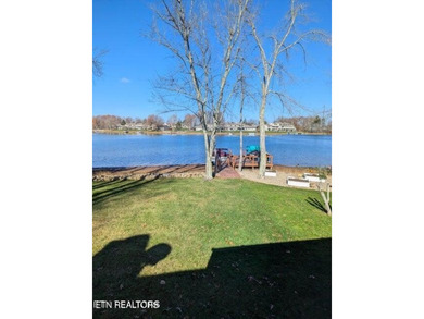 Looking for a peaceful lakefront home in a resort community? on Druid Hills Golf Club in Tennessee - for sale on GolfHomes.com, golf home, golf lot