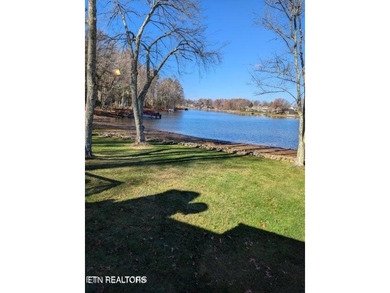 Looking for a peaceful lakefront home in a resort community? on Druid Hills Golf Club in Tennessee - for sale on GolfHomes.com, golf home, golf lot
