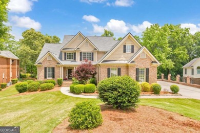 Welcome to your dream home in the prestigious Royal Lakes Golf & on Royal Lakes Golf and Country Club in Georgia - for sale on GolfHomes.com, golf home, golf lot