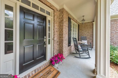 Welcome to your dream home in the prestigious Royal Lakes Golf & on Royal Lakes Golf and Country Club in Georgia - for sale on GolfHomes.com, golf home, golf lot