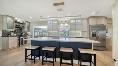 The Best of Both Worlds: A High-End Renovation with Ultra-Low on River Isles Golf Club in Florida - for sale on GolfHomes.com, golf home, golf lot