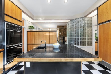 Tucked into the quiet elegance of Treyburn, this NC Modernist on Treyburn Country Club in North Carolina - for sale on GolfHomes.com, golf home, golf lot