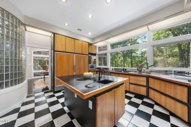 Tucked into the quiet elegance of Treyburn, this NC Modernist on Treyburn Country Club in North Carolina - for sale on GolfHomes.com, golf home, golf lot