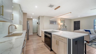 The Best of Both Worlds: A High-End Renovation with Ultra-Low on River Isles Golf Club in Florida - for sale on GolfHomes.com, golf home, golf lot