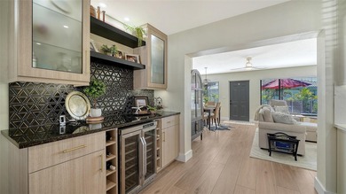 The Best of Both Worlds: A High-End Renovation with Ultra-Low on River Isles Golf Club in Florida - for sale on GolfHomes.com, golf home, golf lot