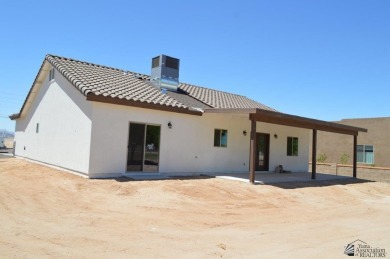 MOVE IN READY. NEW SPEC HOME IN COYOTE WASH GOLF COURSE on The Links At Coyote Wash in Arizona - for sale on GolfHomes.com, golf home, golf lot