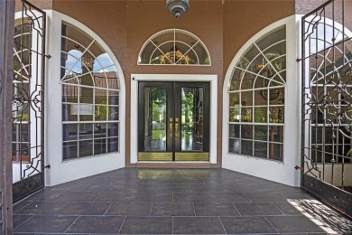 Impressive 4 bedroom, 3 bathroom golf front  home located on a on MetroWest Golf Club in Florida - for sale on GolfHomes.com, golf home, golf lot