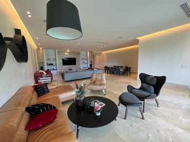 Spacious and comfortable apartment with a grass-covered patio on  in  - for sale on GolfHomes.com, golf home, golf lot